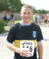 Rich Harrison enjoys a drink after finishing